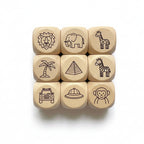 Nine wooden dice with various symbols on a white background