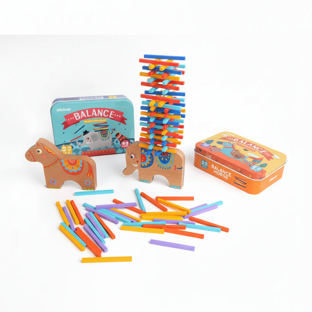 Colorful balance toy set with wooden horse and colorful sticks on a white background