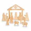 Wooden nativity scene set with stable, figures of Mary, Joseph, baby Jesus, angels, and animals on a white background. WONDER KIIIDS
