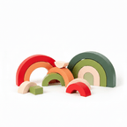 Set of colorful wooden arch-shaped blocks on a white background