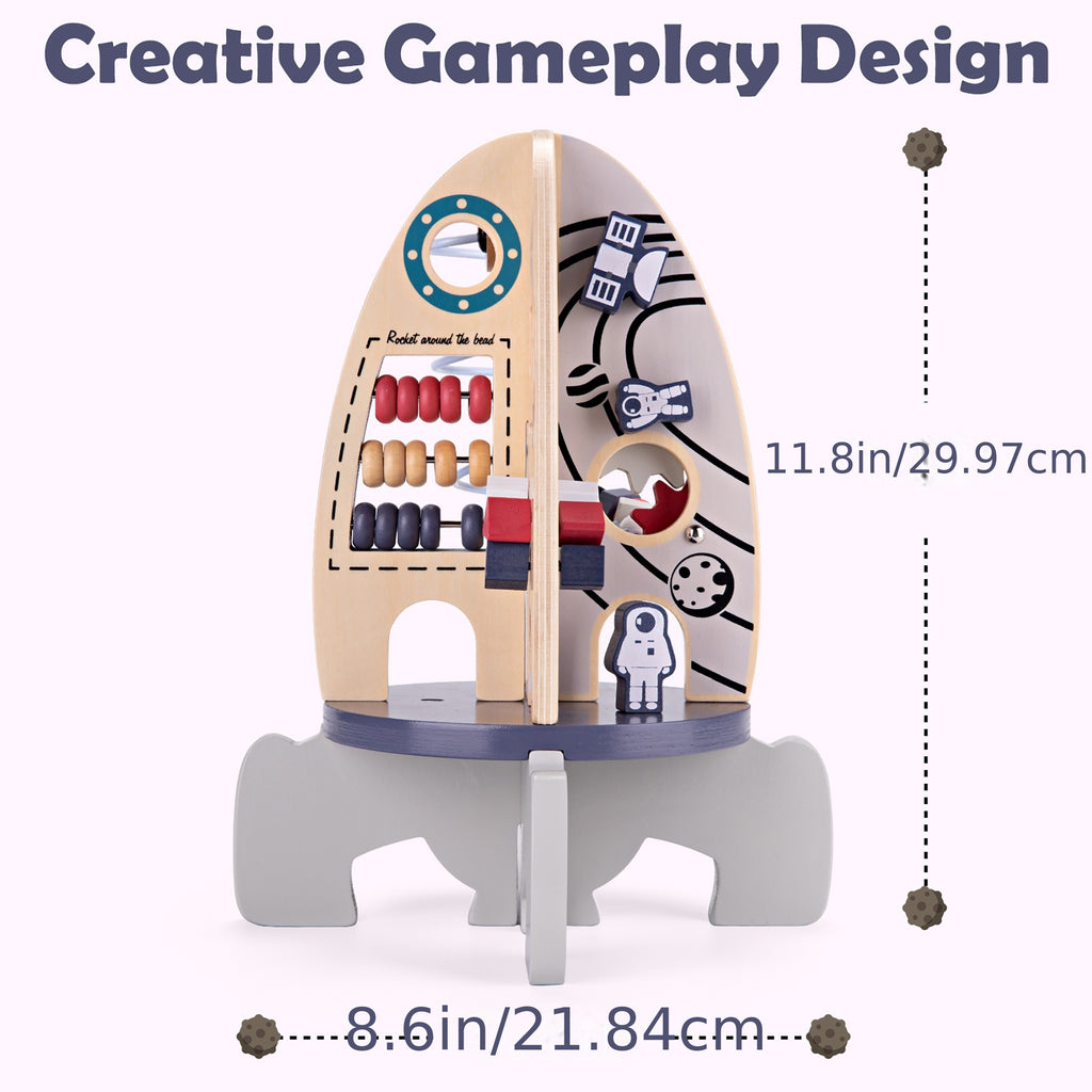 Wooden toy rocket with various compartments and a measurement label on a white background
