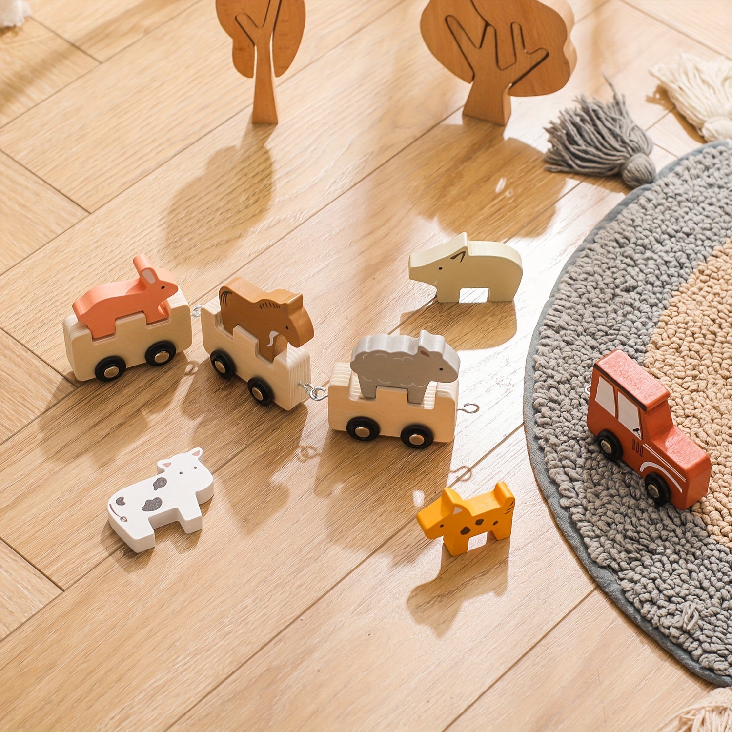 Wooden toy animals on a wooden floor with a rug in the corner.Wooden Splicing Car Toy Set_Wonder Kiiids
