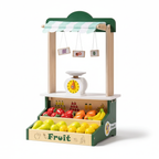 Toy fruit stand with fruits and a scale on a white background _.Wooden Farmers Market Stand Fruit