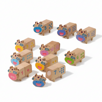 Set of cartoonish cardboard boxes with animal faces and numbers on a white background